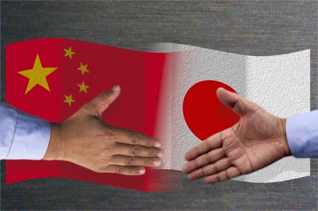 中国と日本の友好関係（握手）