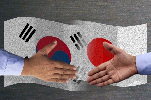 韓国と日本の友好関係（握手）